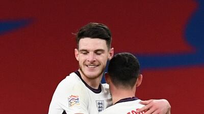 SEngland's Declan Rice and Phil Foden celebrate after the match. Reuters