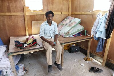 Vinod Kumar said he sometimes runs out of water and has to go to nearby Etihad Mall in Dubai to get more, even though his company policy is that staff are not allowed off site, contrary to the midday break law Pawan Singh / The National