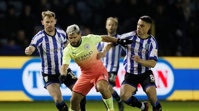Sergio Aguero under pressure from Wednesday players. Reuters