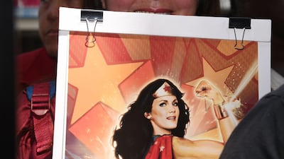 Fans wait to meet actress Lynda Carter at her star unveiling ceremony on the Hollywood Walk of Fame. Robyn Beck / AFP