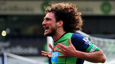 Newcastle United's Fabricio Coloccini celebrates scoring their second goal on Sunday in a 2-0 Premier League victory over West Bromwich Albion at The Hawthorns in West Bromwich. Paul Ellis / AFP / November 9, 2014