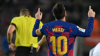Barcelona's Argentine forward Lionel Messi celebrates his second goal during the Spanish league football match between FC Barcelona and Real Valladolid FC at the Camp Nou stadium in Barcelona on October 29, 2019. / AFP / LLUIS GENE