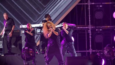 Janet Jackson performs during Jeddah World Fest, flanked by backing dancers. EPA/STR