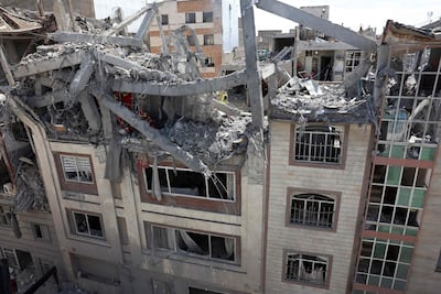 The wreckage of a residential building in Tehran, which has endured a month of US and Israeli strikes. AFP