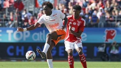 Junior Ndiaye, left, singed his first senior contract at Montpellier and will now hope to make a mark with the UAE national team during the upcoming World Cup qualifiers. AFP