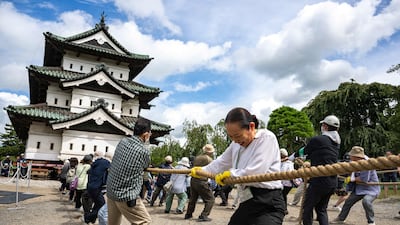 Japan's Hirosaki Castle is hauled back to its original position after undergoing repair work. AFP