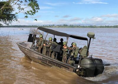A military rescue boat tasked with finding British missing journalist Dom Philipps and Brazilian indigenous expert Bruno Pereira. AFP