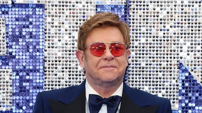 Elton John, in a navy tuxedo, attends the 'Rocketman' UK premiere at Odeon Luxe Leicester Square on May 20, 2019 in London, England. Getty Images