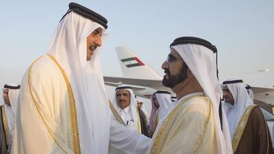 Sheikh Mohammed bin Rashid greets Sheikh Tamim bin Hamad Al Thani Emir of Qatar (L). Seen with Sheikh Hamdan bin Rashid, Deputy Ruler of Dubai and Minister of Finance and Sheikh Saud bin Saqr Al Qasimi, Supreme Council Member and Ruler of Ras Al Khaimah. Mohamed Al Hammadi / Crown Prince Court - Abu Dhabi