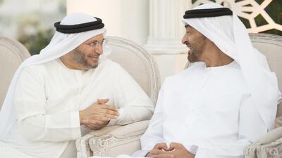 Sheikh Mohammed bin Zayed, Crown Prince of Abu Dhabi and Deputy Supreme Commander of the Armed Forces, speaks with Dr Anwar Gargash, Minister of State for Foreign Affairs, during the wedding reception of Ali Anwar Gargash (not shown). Mohamed Al Suwaidi / Crown Prince Court - Abu Dhabi
