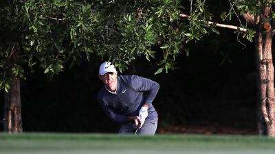 Rory lines up a shot on to the green.