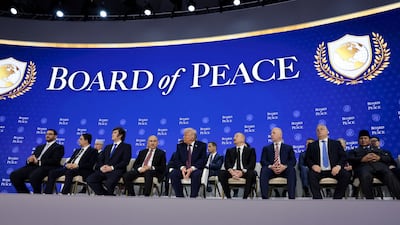 US President Donald Trump with national leaders who signed on to the Board of Peace at the World Economic Forum in Davos, Switzerland, on January 22. Reuters