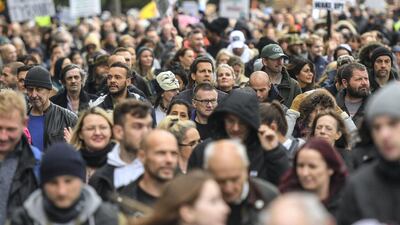 Protesters are seen during a Unite for Freedom march on October 24 in London. Getty Images