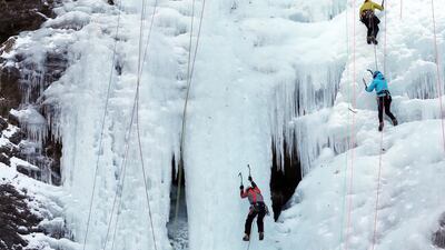 Climbers scale an ice cliff at the Gugok Waterfall in Chuncheon, 85 kilometres east of Seoul is hit by a cold wave. Yonhap / EPA