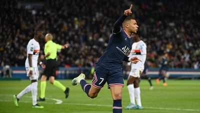 Kylian Mbappe celebrates after scoring for PSG against Lorient. AFP