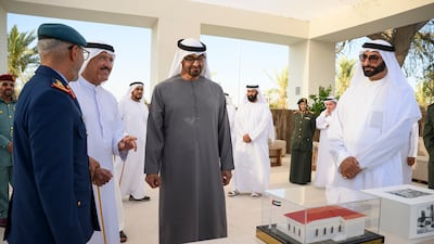 President Sheikh Mohamed bin Zayedat the unification ceremony at Abu Mreikhah with Sheikh Sultan bin Hamdan bin Mohamed, Adviser to the UAE President, second left, Mohamed Ahmad Al Bowardi, Minister of State for Defence Affairs, right, and Maj Gen Essa Saif Al Mazrouei, Chief of Staff of the UAE Armed Forces