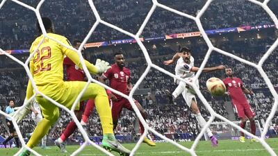 Jordan's Yazan Al Naimat scores his team's opener. AFP