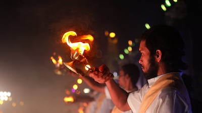Indian devotees perform a Ganga aarti ritual at Sagar Island. EPA