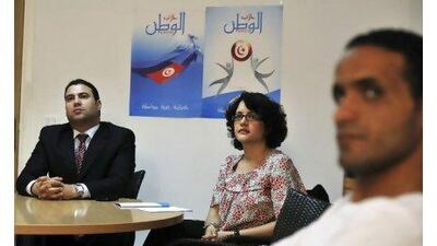 Moez Joudi, left, a co-founder of Al Watan party, attends a training session for members at the party headquarters in Tunis. Lindsay Mackenzie for The National