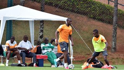 Yaya Toure, centre, shown at an Ivory Coast training session on June 9, 2014 ahead of the 2014 World Cup in Brazil. Issouf Sanogo / AFP