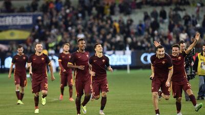 AS Roma players celebrate after winning a penalty shootout over Real Madrid during the International Champions Cup friendly match on Saturday in Melbourne. Julian Smith / EPA / July 18, 2015