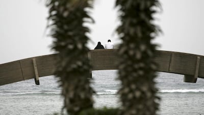 A couple on the Corniche in Jeddah in Saudi Arabia. Kami / arabianEye / Corbis