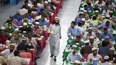Men fill up the dining hall at the Saadiyat Accommodation Village on the Saadiyat Island in Abu Dhabi. Silvia Razgova / The National
