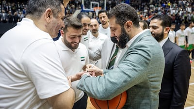 Syrian President Ahmad Al Shara attends a friendly basketball match between Syria and Lebanon at the inauguration of a renovated stadium in Damascus. Photo: Syrian Presidency