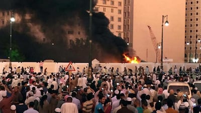 Muslim worshippers gather after a suicide bomber detonated a device near the security headquarters of the Prophet’s Mosque in Medina, Saudi Arabia on July 4, 2016. Reuters Handout