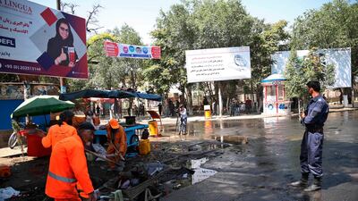 Security forces stand guard near the site. AP Photo