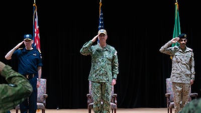 Naval commanders from the UK and the US join Saudi Navy Commodore Fahad Al Joaid during a ceremony in Bahrain. Photo: US Naval Forces Central Command