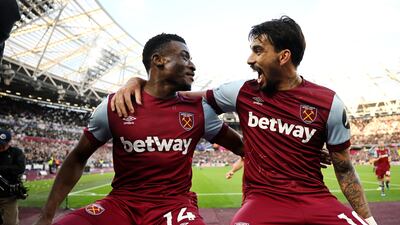 West Ham United's Mohammed Kudus celebrates with teammate Lucas Paqueta after scoring their second goal in the Premier League game against Wolverhampton Wanderers at London Stadium on December 17, 2023. Getty Images