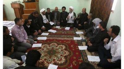 Supporters of the Shiite cleric Moqtada al Sadr meet in Baghdad yesterday. He has given the government six months to improve.