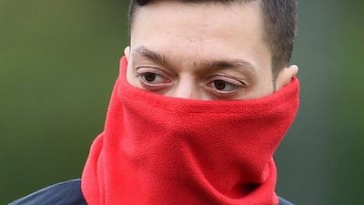 epa05175098 Arsenal playmaker Mesut Oezil during a training session with team mates at Arsenal's training complex at London Colney, north of London, Britain, 22 February 2016. Arsenal play Barcelona in a Champions League Round of 16 soccer match at the Emirates Stadium in London 23 February. EPA/ANDY RAIN