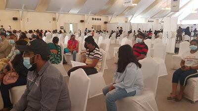 Pupils at Delhi Private School Dubai wait to receive the first dose of the Covid-19 vaccine.