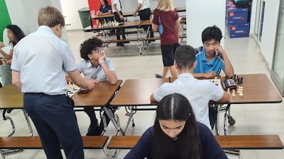 Chess players engrossed in calculated moves and plotting strategic triumphs