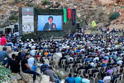 Hezbollah supporters attend a televised speech by the group's leader Hassan Nasrallah in the Janta region in Lebanon's east this month. AFP