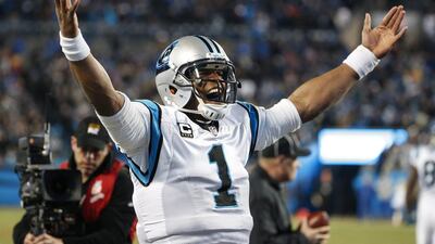 Carolina Panthers quarterback Cam Newton celebrates a touchdown against the Arizona Cardinals on Sunday in his team's NFC championship game victory. Erik S Lesser / EPA / January 24, 2016