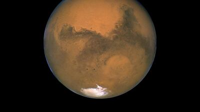 An Abu Dhabi-based researcher has found evidence to suggest lifeforms could exist beneath the surface of Mars. Nasa/AP
