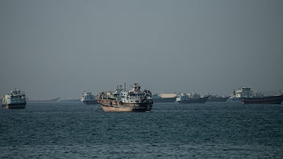 Vessels anchored at the Strait of Hormuz, as seen from Musandam, Oman. The slip in oil prices comes as traders bet that the US and Iran will eventually agree to reopen the key waterway. Reuter