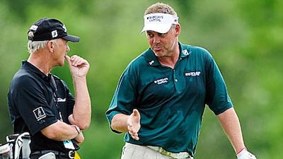 Darren Clarke, right, shares a joke with Pete Cowen, his swing coach, have a chat during the pro-am prior to the Irish Open last week in Killarney.