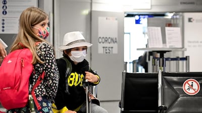 Travelers wait inside of a walk-in test center for coronavirus at the International Airport in Duesseldorf, Germany, 27 July 2020. EPA