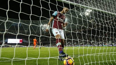 West Ham United's Winston Reid gets the ball out of the goal after Alexis Sanchez completed a hat-trick against them last weekend. John Sibley / Action Images / Reuters / December 3, 2016
