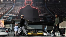 A billboard in Tehran depicts Benjamin Netanyahu in an empty UN hall. It is not yet known whether the Israeli Prime Minister will form a new government after elections. Reuters