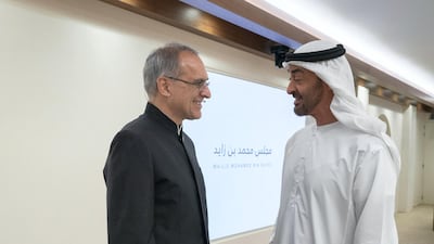 Sheikh Mohamed bin Zayed, Crown Prince of Abu Dhabi and Deputy Supreme Commander of the UAE Armed Forces (R), greets Dr Pavan Sukhdev (L), during a lecture titled: ”Redefining wealth for an economy of performance", at Majlis Mohamed bin Zayed.
