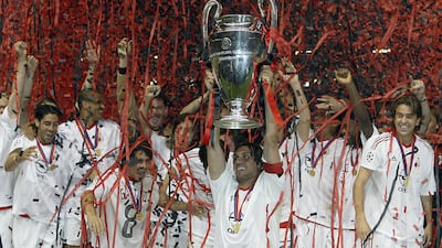 AC Milan captain Paolo Maldini lifts the Champions League trophy, after defeating Juventus on penalties in Manchester, May 2003. All photos: Getty Images