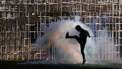 Police use tear gas to disperse an anti-government protest by students in Tirana, Albania. Reuters