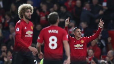 Manchester United's Alexis Sanchez celebrates after scoring his side's third goal. AP Photo