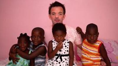 Matthew Morgan-Jones and his four adopted children from Sierra Leone.
