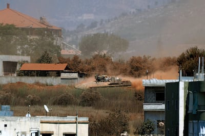 Israeli vehicles manoeuvring in a southern Lebanese village. Israel occupies large parts of the south. AFP